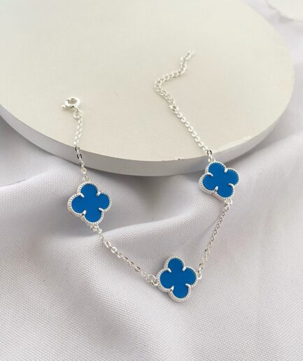 Pulseira preta 3 trevos azul - 18 cm + 5 cm extensor
